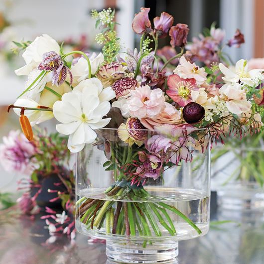 Magnolia blooms—paired with Ranunculus, sweet peas and fritillaries—are the stars of this exquisite springtime bouquet.