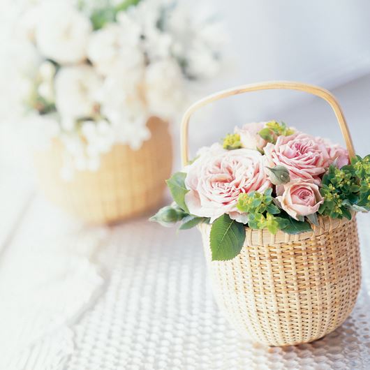 Romantic basket arrangements featuring garden-style blooms.