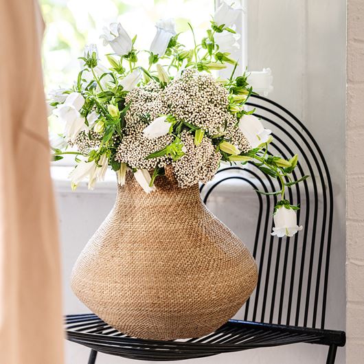 'Victoria White®' rice flower and Campanula add wonderful volume and texture to this arrangement.