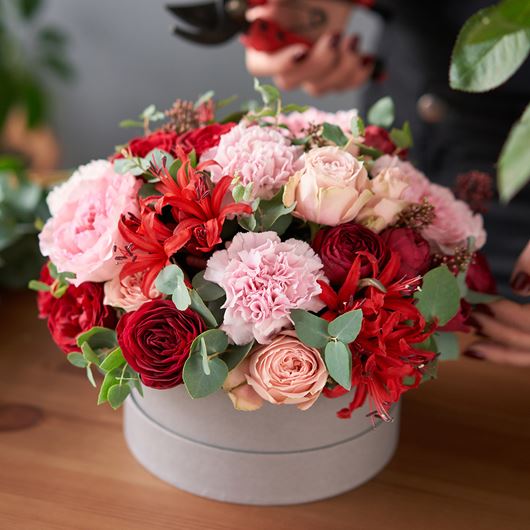 Valentine's Day arrangement featuring a classic holiday palette.