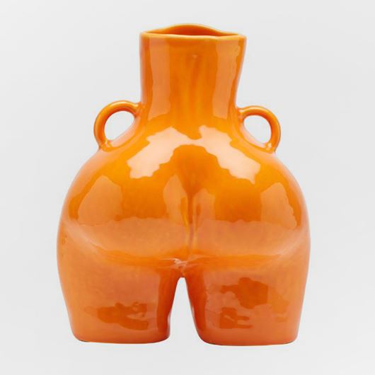 "Love Handles" vase (orange shiny) by Anissa Kermiche.