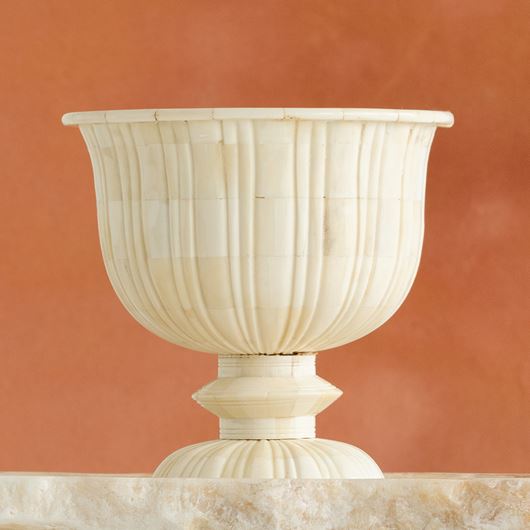 Roman-inspired urn.