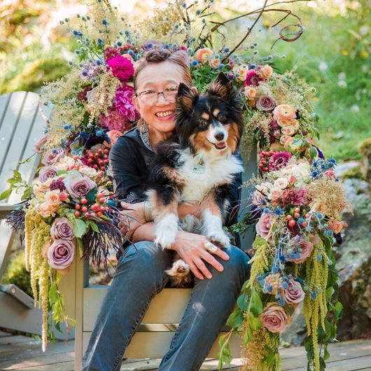 Ethereal flower installation using an Adirondack-style chair.