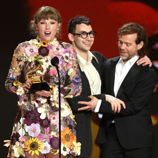 Taylor Swift, Jack Antonoff, and Aaron Dessner accept the Album of the Year award for ‘Folklore’ onstage during the 63rd Annual GRAMMY Awards.