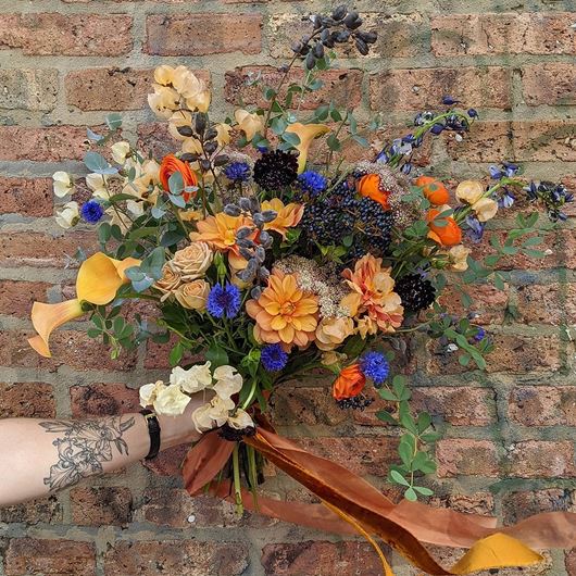 Hand-tied bouquet featuring a whimsical palette.