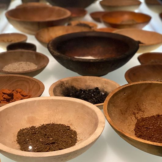 Assorted wooden bowls with spices.