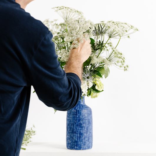 Centerpiece featuring Ammi majus as the star.